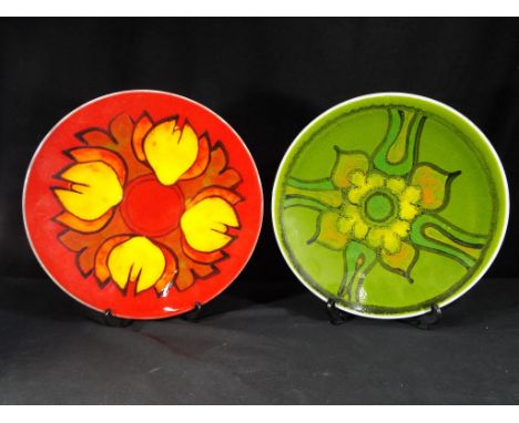 Two Poole Pottery Delphis Range shallow dishes, shape No. 4, approximately 27 cm (d). Estimate £20 - £40