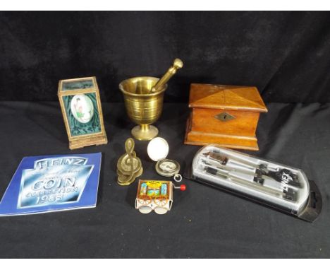A Royal Mint uncirculated coin collection 1983, technical drawing equipment, brassware, a white metal compass, a painted egg 