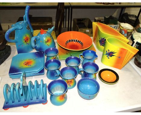 A group of modern designed ceramic tableware, one piece signed and marked Carouge, Switzerland, 2007, including a teapot, six
