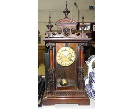 A walnut American mantel clock, an ebonised print after Bartolozzi and other items. 
