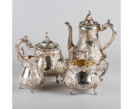 A FINE VICTORIAN SILVER FOUR-PIECE TEA AND COFFEE SERVICE § by Robert Harper, London 1862, comprising teapot, coffee pot, cre