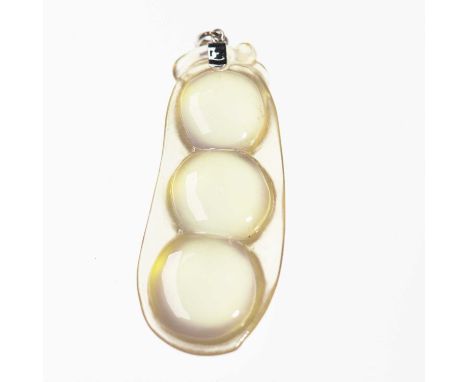 A JADE AND DIAMOND BEAN POD PENDANT a carved bean pod inset with a round brilliant-cut diamond, to a diamond-set bail. Marked
