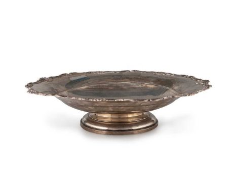 AN EDWARD VIII SILVER PEDESTAL DISH by Mappin &amp; Webb Ltd, Birmingham 1936, the heptagonal shallow bowl with an S-scroll a