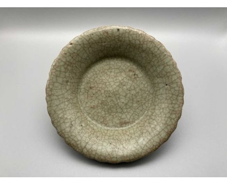 A VERY RARE LONGQUAN GE-TYPE BLACK-BODY DISH, SOUTHERN SONG / YUAN DYNASTY, 13TH – 14TH CENTURY with shallow sides flaring at