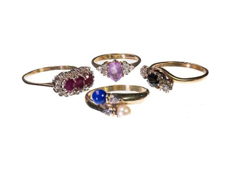 FOUR GEM-SET RINGS comprising A 9 CARAT GOLD RUBY AND DIAMOND TRIPLE CLUSTER RING, hallmarked London 1985, ring size T1/2; A 