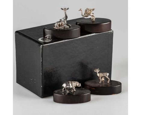 PATRICK MAVROS: A SET OF FOUR STERLING SILVER PLACE CARD HOLDERS comprising hippo, ostrich, giraffe and impala, each on a Zim