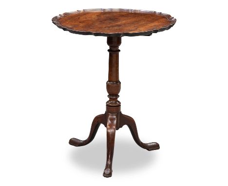 A GEORGE III MAHOGANY TILT-TOP TRIPOD TABLE the circular top with piecrust edge, raised on a columnar stem continuing to down