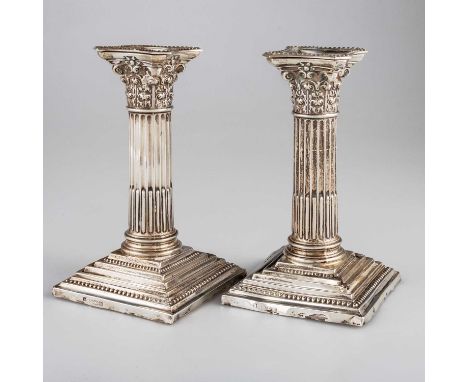 A PAIR OF GEORGE V SILVER CORINTHIAN COLUMN CANDLESTICKS by Walter Latham &amp; Son, Sheffield 1921, each with stop-fluted co