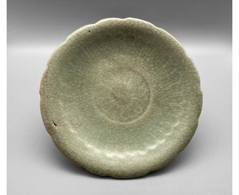 A RARE LONGQUAN GUAN-TYPE FOLIATE-RIMMED SHALLOW DISH, SOUTHERN SONG DYNASTY, 13TH CENTURY  the dish with a concave shallow c