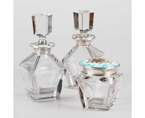 A SET OF THREE SPANISH SILVER, ENAMEL AND GLASS DRESSING TABLE JARS/BOTTLES post-1934, comprising a pair of large scent bottl