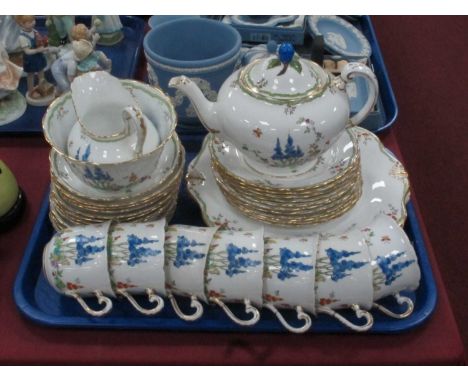 A Tuscan China Tea Service hand painted with blue flowers comprising of teapot, teacups, saucers, side plates, milk jug, suga
