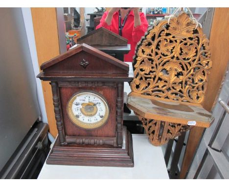 Oak Cased Mantle Clock, with automatic alarm by Fattorini &amp; Sons, Bradford, 32cm wide, gilt wooden wall bracket.