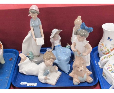Five Nao Figures, including Bedtime Reading, Girl with Toy Lion, etc:- (5)