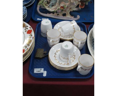 A WWI Trench Art Cigarette Lighter, 1914-1915 Marked, together with six Spode Delphi coffee cups and saucers.
