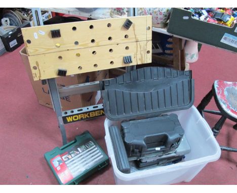 Bosch Impact Drill, cordless screwdriver, other tools (untested sold for parts only). Workbench.