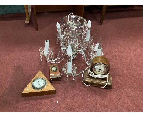 Five Scroll Branch Glass Chandelier, with faceted drops together with Smiths Cricklewood Dashboard Clock, in later triangular