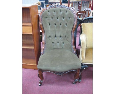XIX Century Walnut Chair, with a carved top rail, upholstered button back, upholstered seat on cabriole legs (damages).