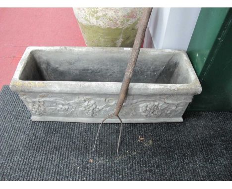 Reconstituted Stone Rectangular Trough, the grape to grape decoration, together with a hay pitch fork, 100cm (2)