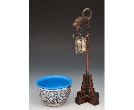 A Chinese silver circular bowl late 19th Century with Peking blue glass liner, the bowl of open work form with bamboo and bir