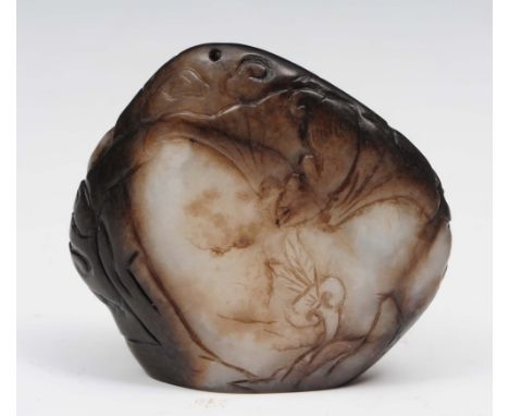 A Chinese white and black jade seal 19th Century the pebble carved with a bat above a sacred fungus with a tuft of grass inte