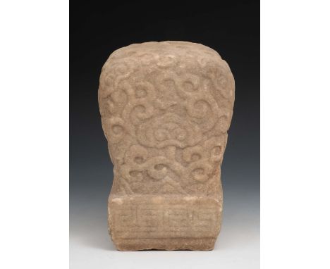 A Chinese carved stone finial probably Tang dynasty carved with cloud and ruyi designs with square base, 28cm high