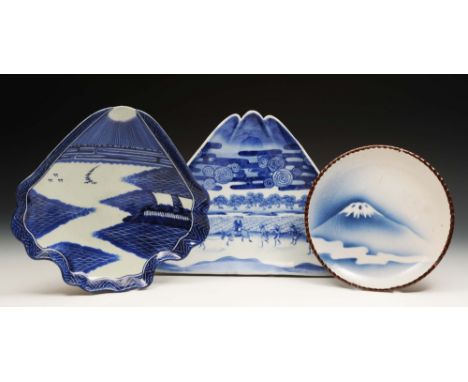 A Japanese Arita blue and white dish decorated with Mount Fuji, 21cm and two other Japanese blue and white dishes of fan shap