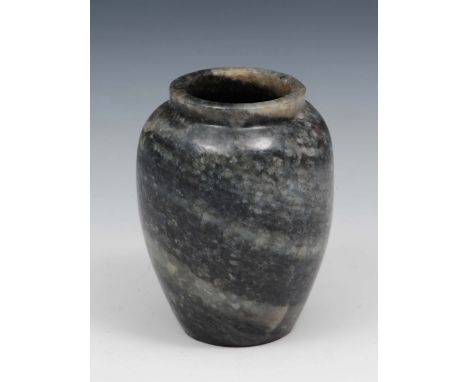 A Chinese white grey and black jade miniature vase  17th/18th Century of striated colours with rounded shoulders turned out t