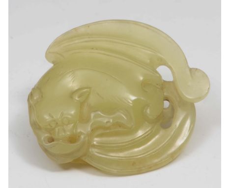 A Chinese yellow jade pendant 18th/19th Century in the form of a bat feeding on a peach tree, 4.9cm long