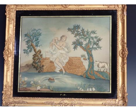 A framed Georgian Needlework Panel depicting young girl beside a pond and tree with sheep, with verre eglomise inner frame, b
