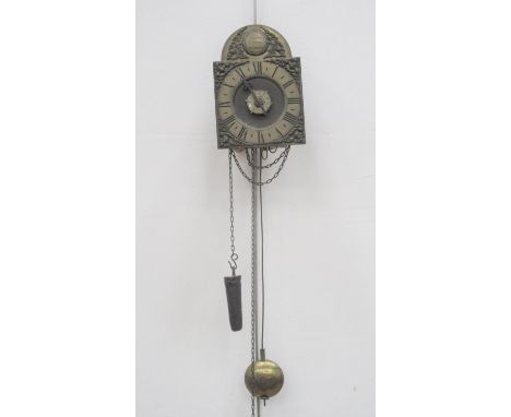 A small lantern type Wall Clock, the arch to the brass dial inscribed Benjamin Cotton, Hurley, weight driven, striking on a b