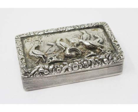 A George IV silver Snuff Box by William Simpson, the top with embossed scene depicting a covey of game birds and the sides an