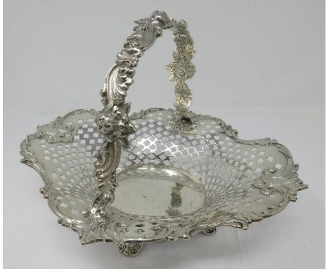 A Tiffany &amp; Co sterling silver pierced oval Cake Basket with scroll and floral design, No 15623/3355, 10 x 8 3/4 in, 506 