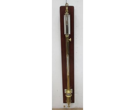 A brass maritime Barometer and Thermometer by F. Darton &amp; Co, London 1940 on mahogany mount 3ft 8in L 