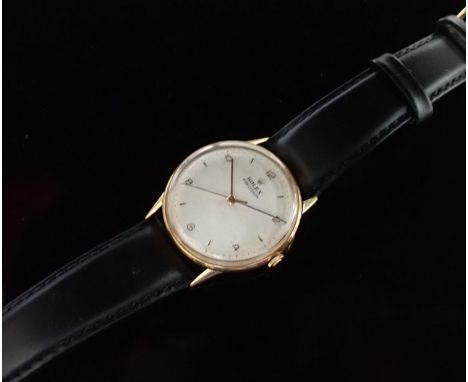 A 1950's gentleman's Rolex Precision manual Wristwatch, the textured dial having gold chevrons and Arabic numerals at quarter