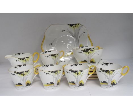 A Shelley Tea Service for six - Sunset and Tall Trees pattern, six Cups and Saucers, Plates, Milk Jug, Sugar Bowl and Cake Pl