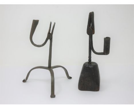 An early 18th Century Rush Light Holder on chamfered column and tripod supports 9in H, and another early Rush Light Holder on