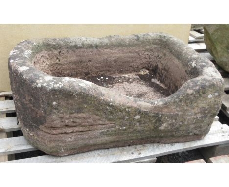 An antique stone D-end Trough 2ft 6in W x 1ft 8in D x 1ft H 