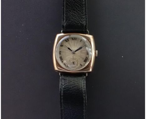 A 1920's gentleman's manual Rolex Wristwatch, the textured silvered dial with Roman numerals and subsidiary seconds dial in 9