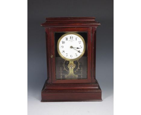 A Eureka electric Mantel Clock No.9061, Patent No.14614 1906 in mahogany case 15in H x 11in W 