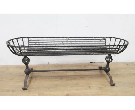A wrought iron Garden Trough with cheval frame having spiral supports, 5ft 2in 