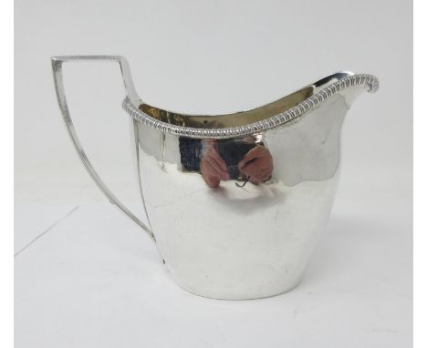 A George III silver plain oval Jug, London 1804, maker: S. Hennell 