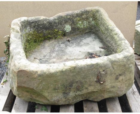 A large rectangular stone Trough of irregular form 2ft 5in W x 1ft 9in D x 1ft 5in H 