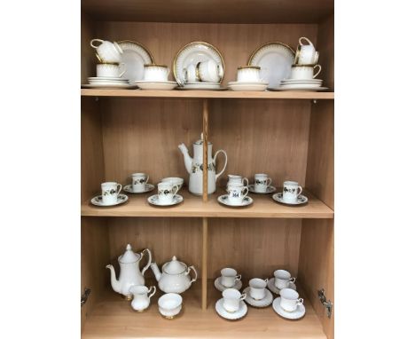 A 15 piece Royal Doulton Larchmont coffee set, 15 piece Royal Albert Val D'or tea/coffee set (chip to pot lid &amp; coffee po