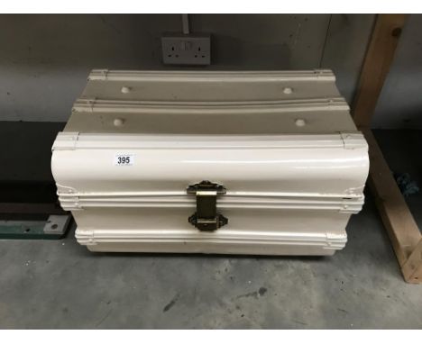 A painted metal trunk