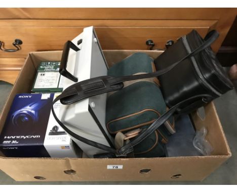 An assortment of items including video camera/ handy cams &amp; typewriter etc.