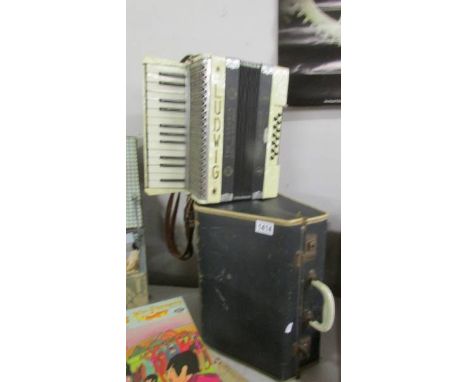 A cased Ludwig 'Antoria' accordion.