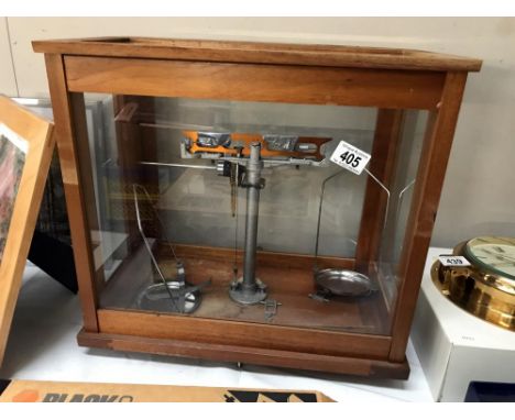 A cased set of apothecary scales