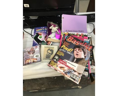 A good mix of Beatles items with script for 'A Hard Day's Night' and a signed Ringo Star CD.