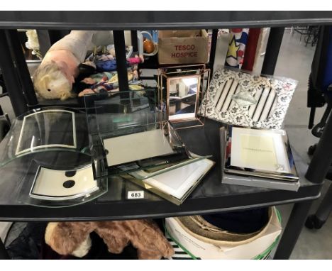 A shelf of new picture frames