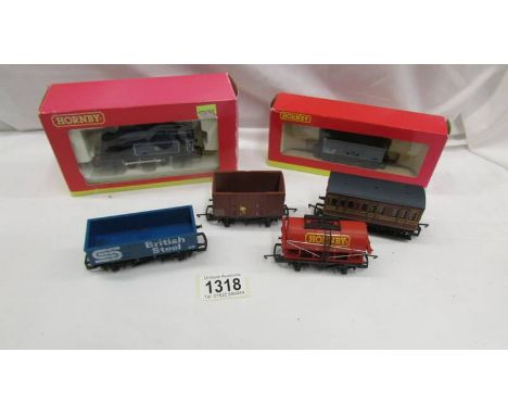 A Hornby 00 gauge engine and 5 rolling stock.